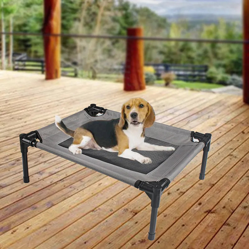 Black oxford cloth outdoor dog bed with steel frame measuring 55cm wide for camping and travel