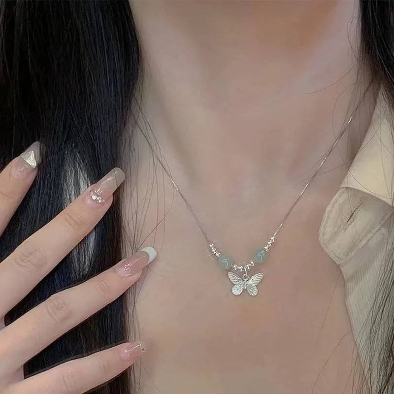 Silver butterfly necklace and bracelet set for women with electroplated copper construction
