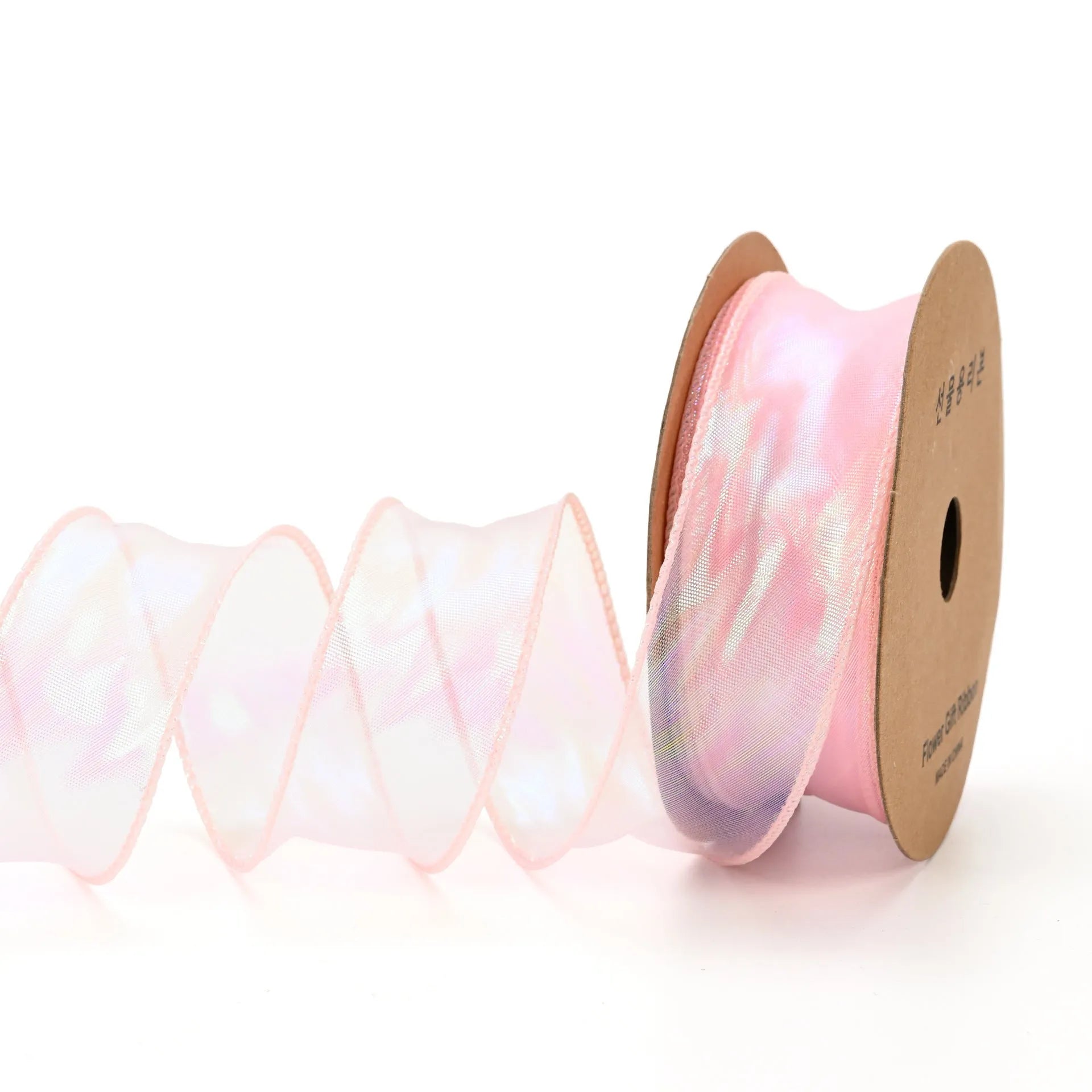 Roll of colourful fishtail yarn mesh decorative ribbon showing wave texture and multiple colour options