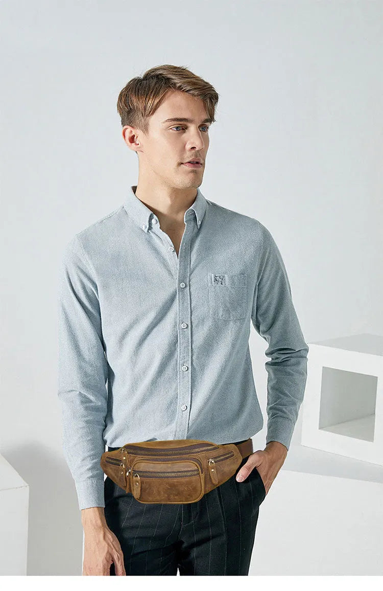 Brown leather messenger bag with single shoulder strap showing front pocket and dimensions