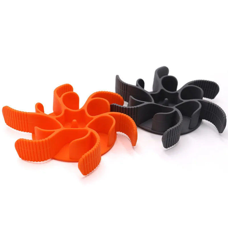 Grey silicone dog slow feeder insert with spiral design and suction cups on base