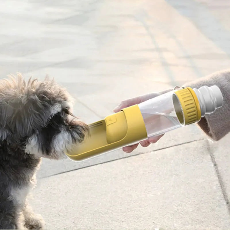 Portable dog water bottle with built-in bowl in dark blue, white, or yellow colours