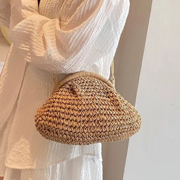 Women's straw beach shoulder bag in khaki colour with chain accent detail