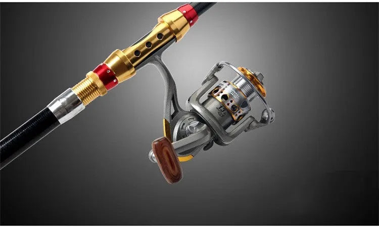 Carbon fibre telescopic spinning fishing rod with metal handle, extended, on a boat deck.