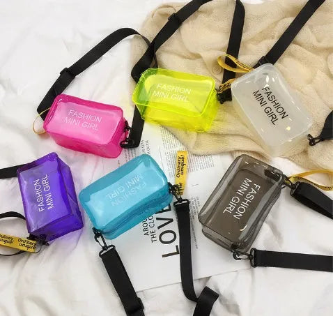 Transparent square women's shoulder bag with adjustable strap in multiple colour options showing internal mobile phone pocket