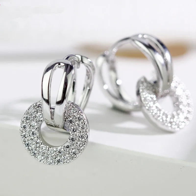 Fashion copper geometric zircon earrings in gold, platinum, and rose gold colours for women