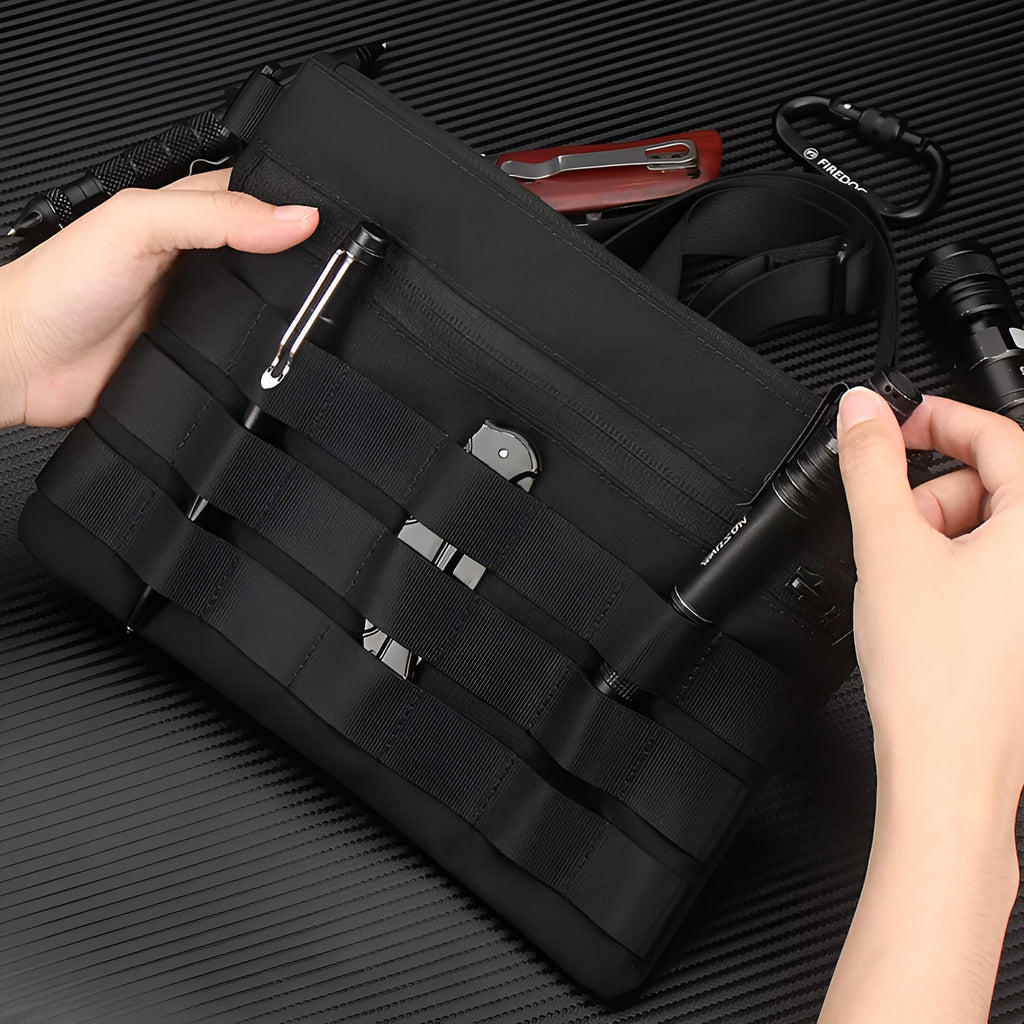 Black Oxford cloth portable outdoor organiser kit measuring 18 by 3.5 centimetres