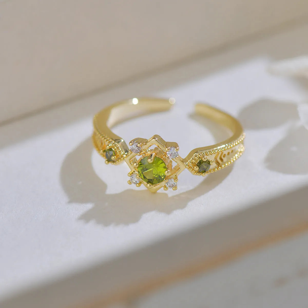 French style geometric open mouth ring with copper band and zircon stones in olive green or purple options