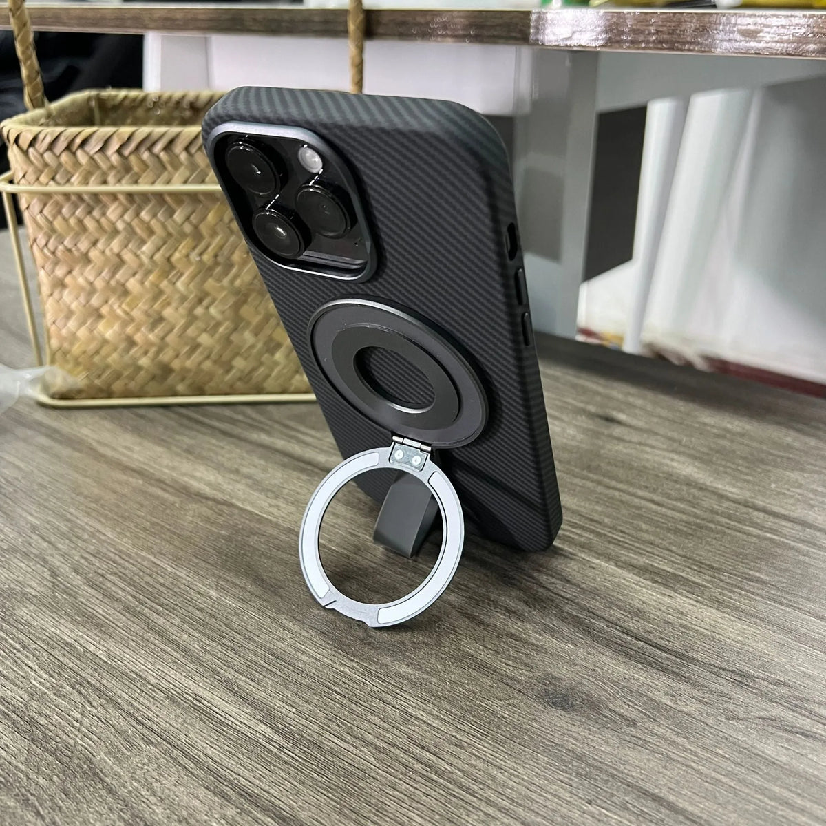Portable magnetic wrist strap round silicone phone holder in hand, five colour options
