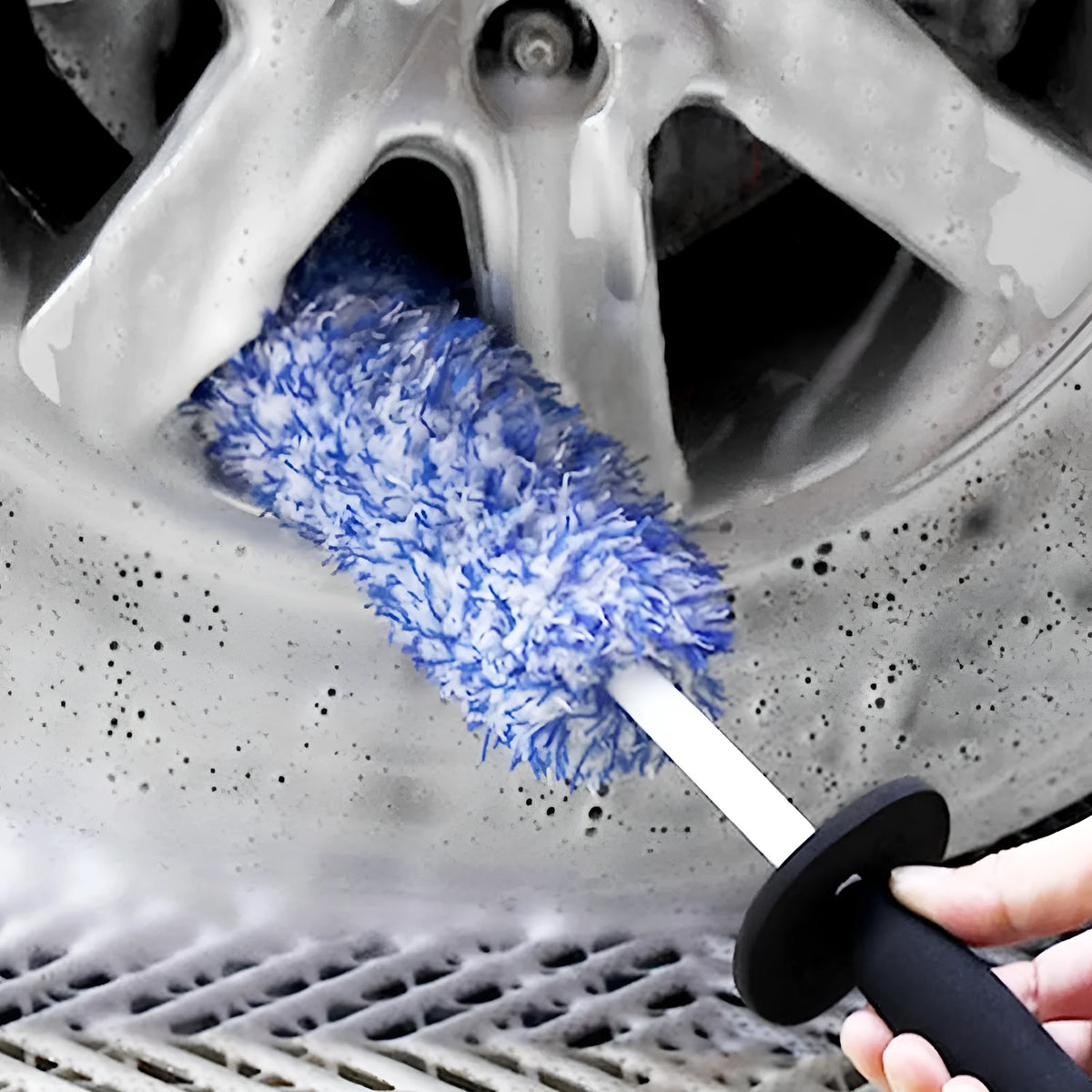 Two steel rim hub cleaning brushes in blue and black with superfine fibre bristles