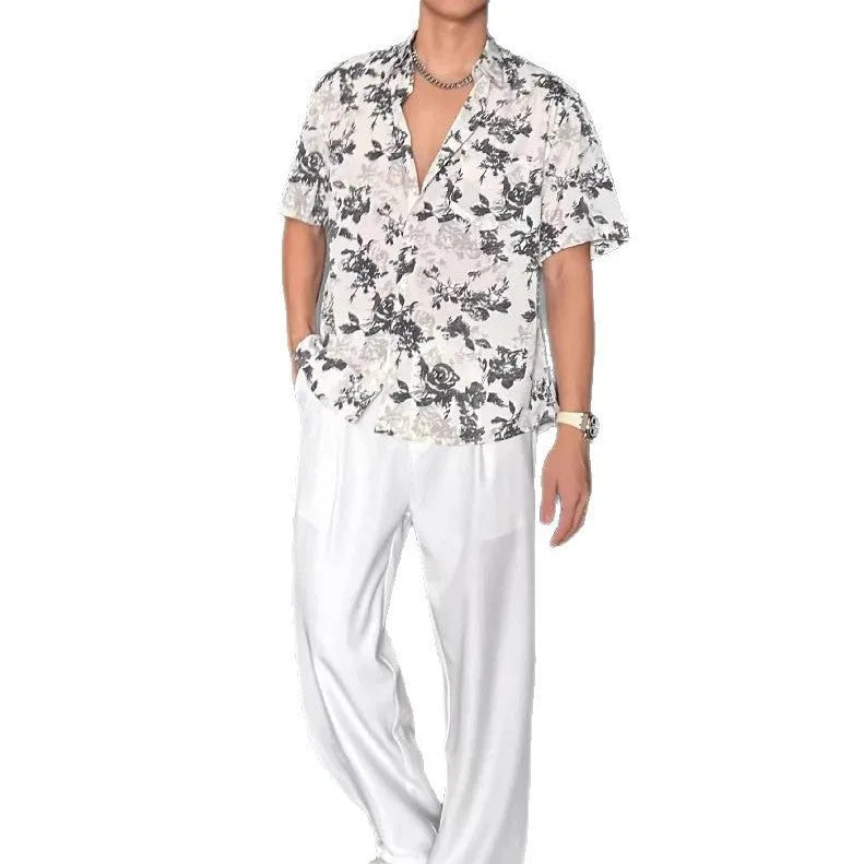Men's loose fit short sleeve shirt with floral print in black or white colour options