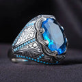 Geometric antique silver alloy ring with blue zircon stone showing European American styling