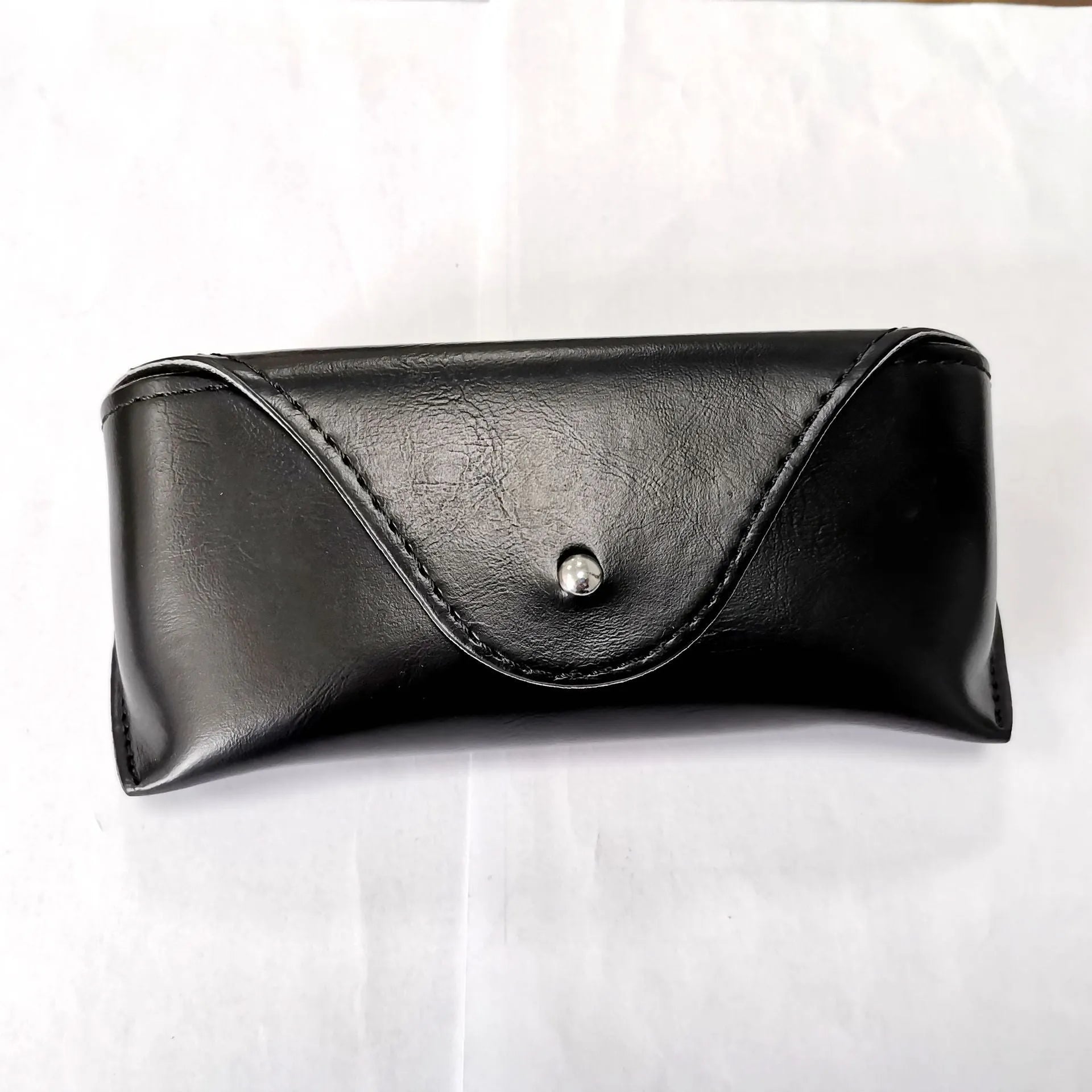 Leather glasses case for sunglasses storage in black, brown, and navy blue