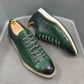 Handmade men's low-cut shoes with an embossed pattern and front-tie lacing.