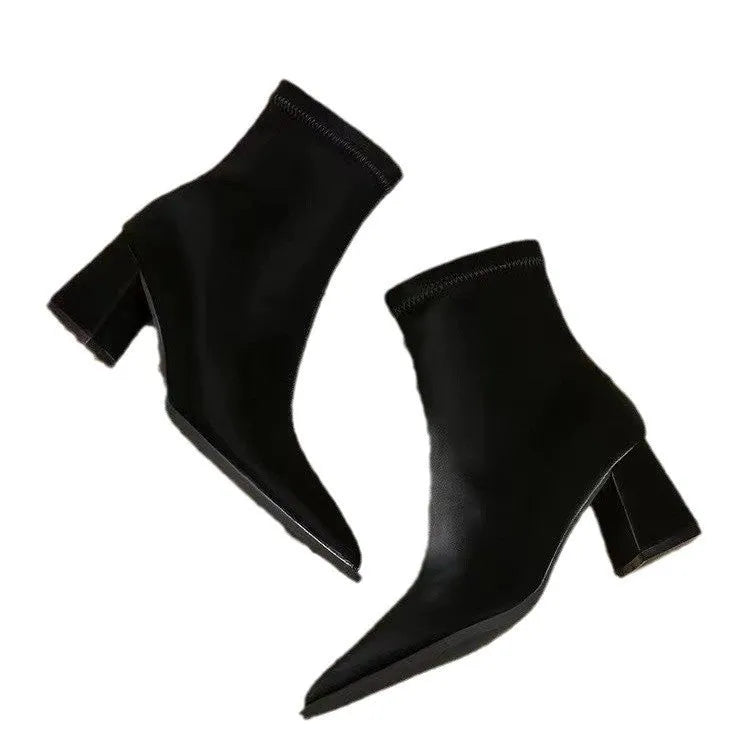 Women's khaki stretch suede pointed-toe ankle boots with a wedge heel on a white background.