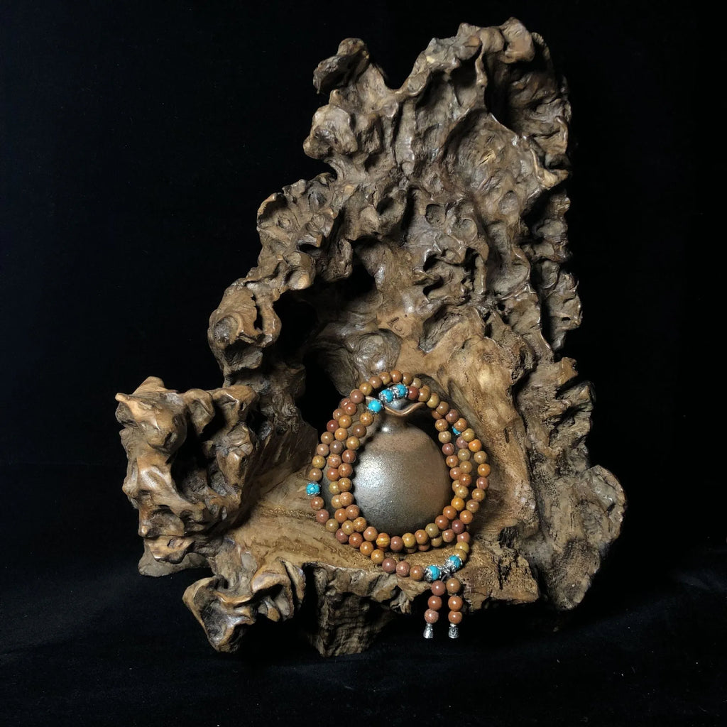 108 bead natural stone bracelet with hand-polished geometric lvzhu beads measuring 5-6mm diameter