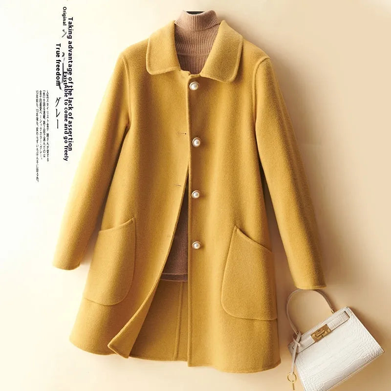 Women's wool mid-length coat with doll collar and pearl buckle in solid colour options