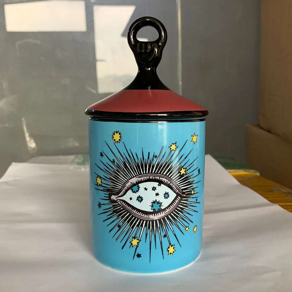 Big Eyes ceramic candle holder in blue with decal figures and gods, used as candle cup and jar storage