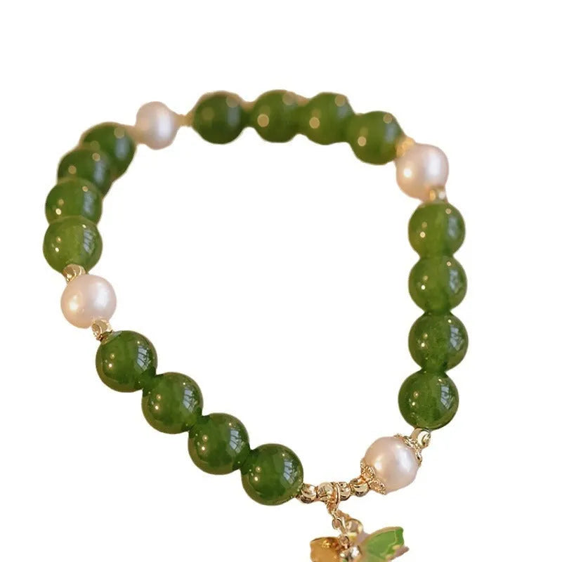 Natural green chalcedony women's bracelet with geometric round elements and handmade construction