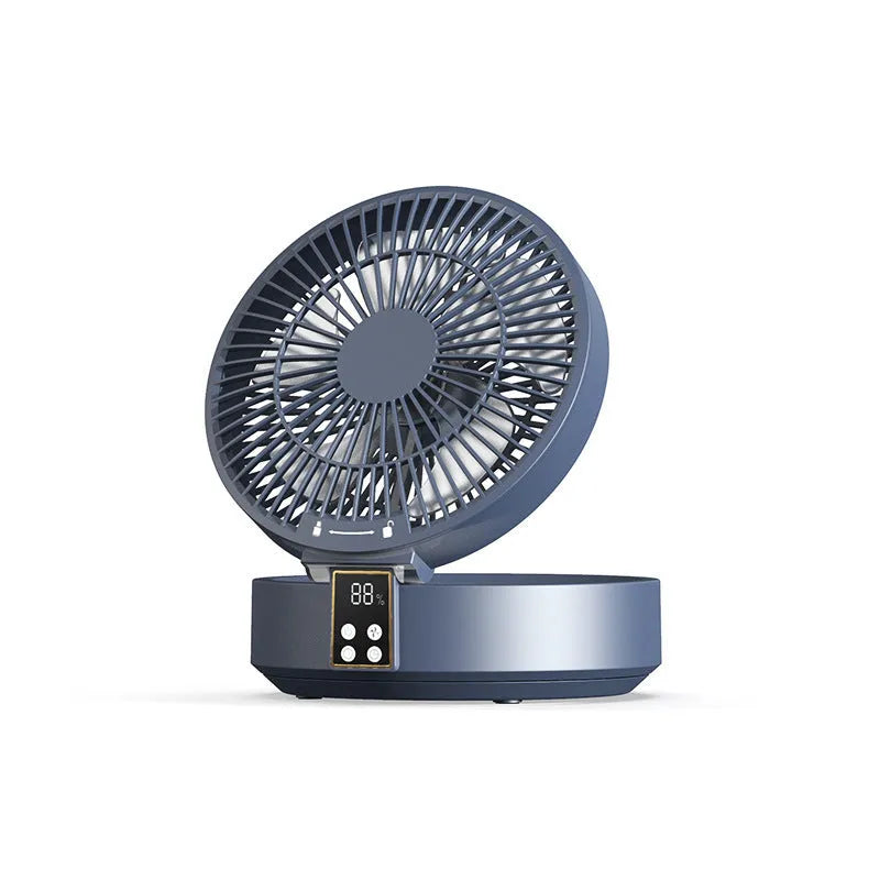 White portable folding fan with remote control on desk showing night light and adjustable angle