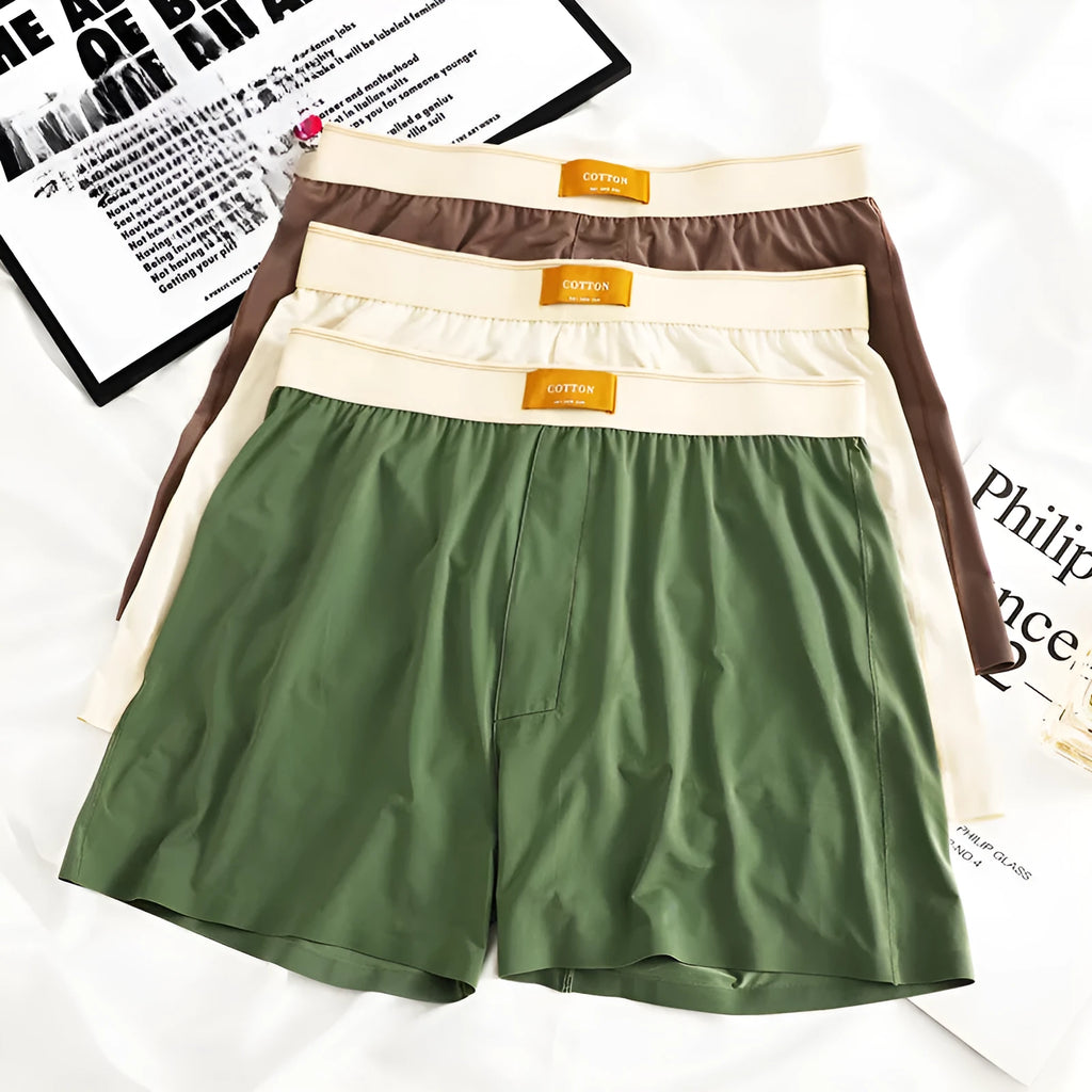 Men's ice silk underwear in solid colours showing loose fit and mid waist design