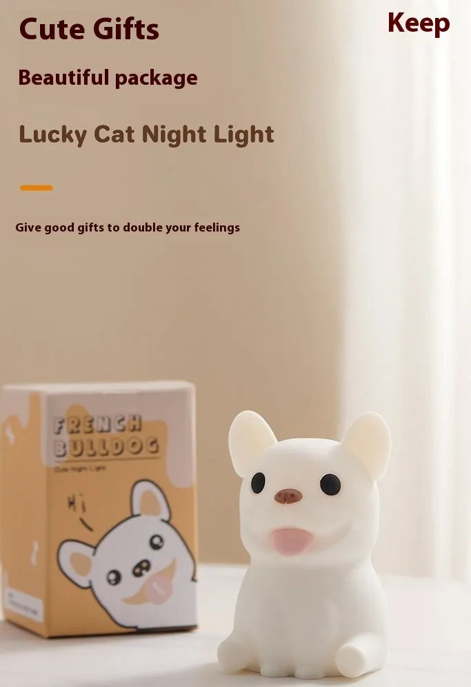 Cartoon animal USB night light with dimming control on bedside table