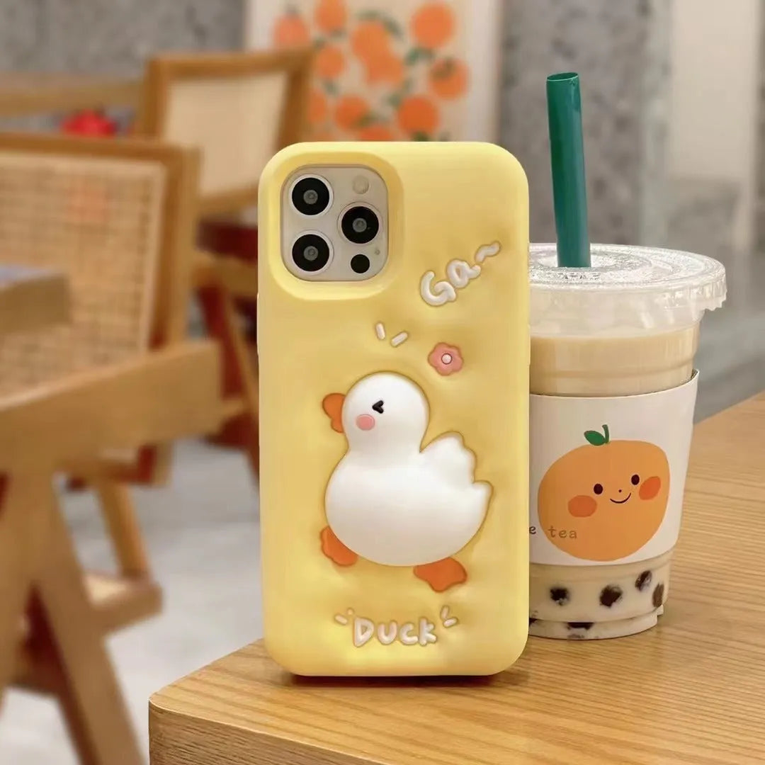 Yellow silicone phone case with three-dimensional cartoon duck for iPhone, featuring press pinch decompression element