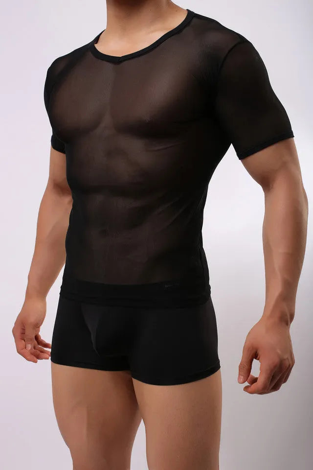 Man wearing a slim fit, transparent mesh short-sleeved T-shirt in a solid colour.