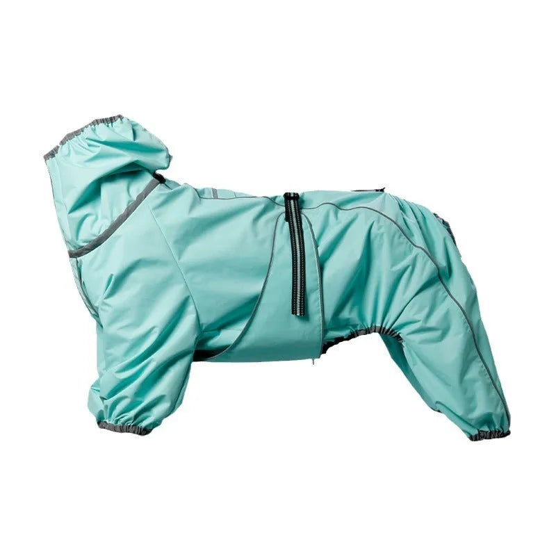 Dog wearing a red thickened cotton-padded winter shell jacket outdoors.
