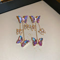 Silver needle crystal flowers butterfly tassel earrings with blue purple motifs and electroplated alloy construction