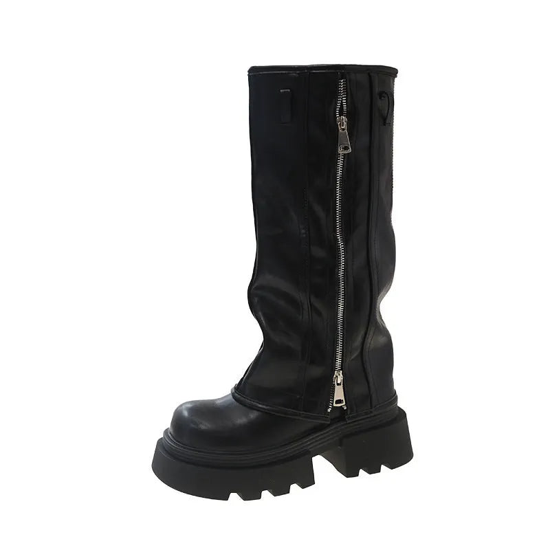 Black platform muffin pants Martin boots with a high cylinder sock and square heel.