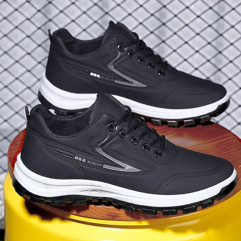 Waterproof leisure shoes with artificial PU upper in black and grey colour combination