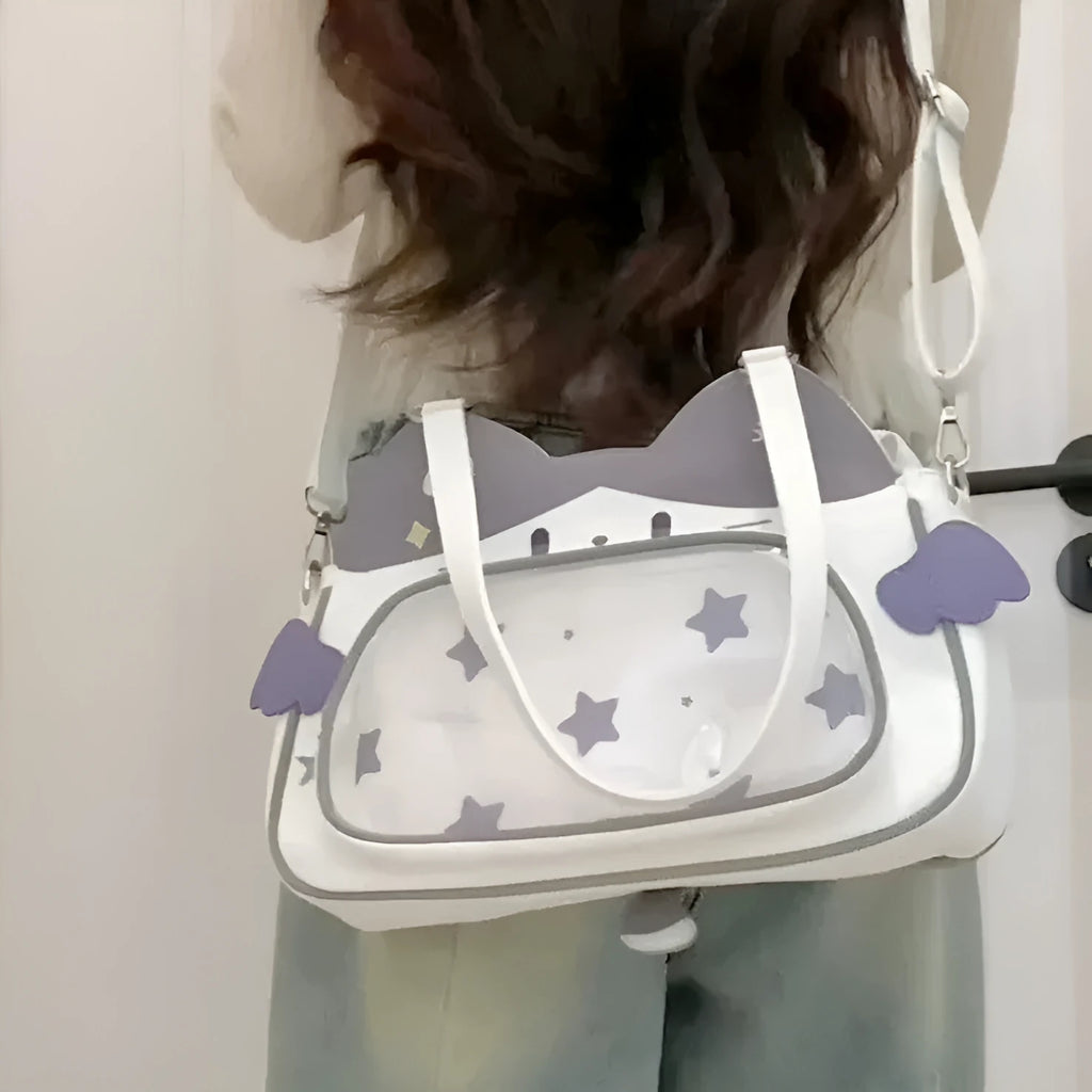 Horizontal cartoon owl pin PU crossbody bag in black, side view showing stitching and single strap