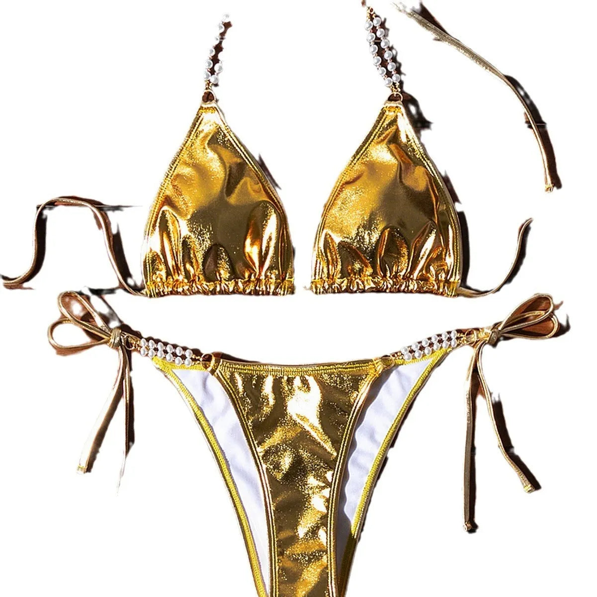 Gold halter lace-up bikini swimsuit with pearl chain detailing on mannequin
