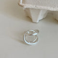Women's geometric open ring with interlaced design in matte gold or silver tone metal