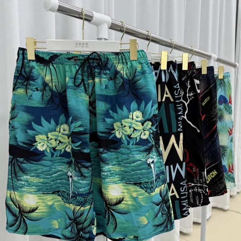 Men's loose ice silk beach pants with striped pattern showing elastic waist and quick-dry fabric
