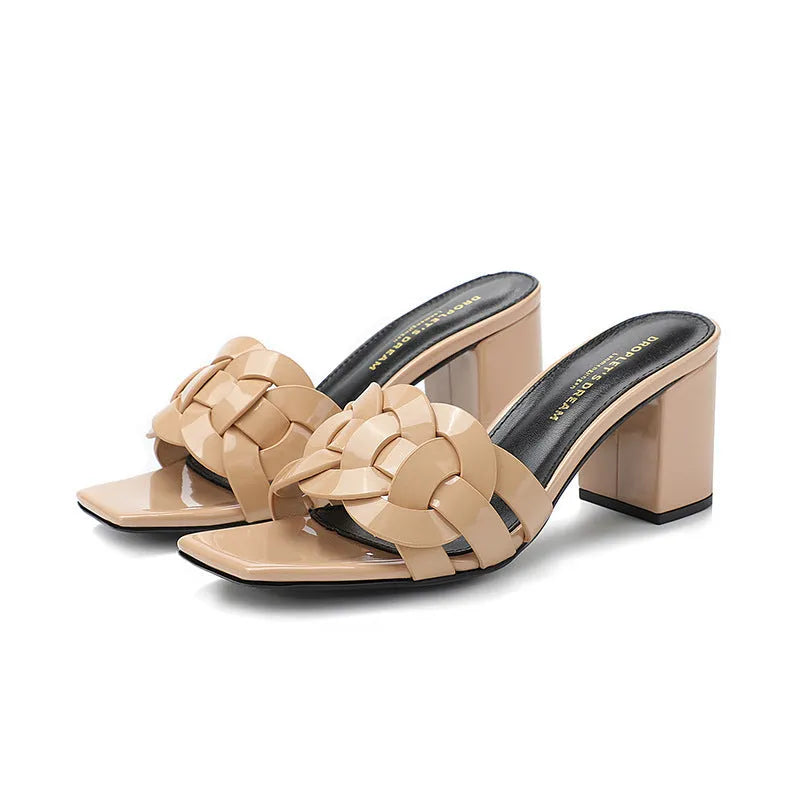 Handmade woven chunky heel slippers in apricot colour with a patent leather upper and rubber sole.