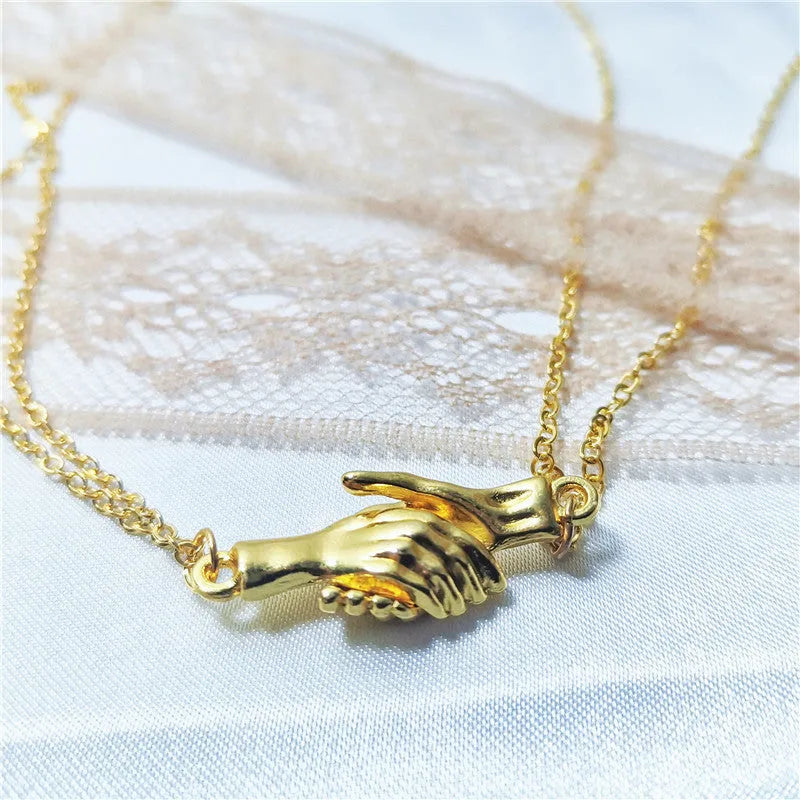 Palm couple magnet necklace with handshake clavicle chain in Korean style alloy geometric pendant white gold platinum black silver matt black