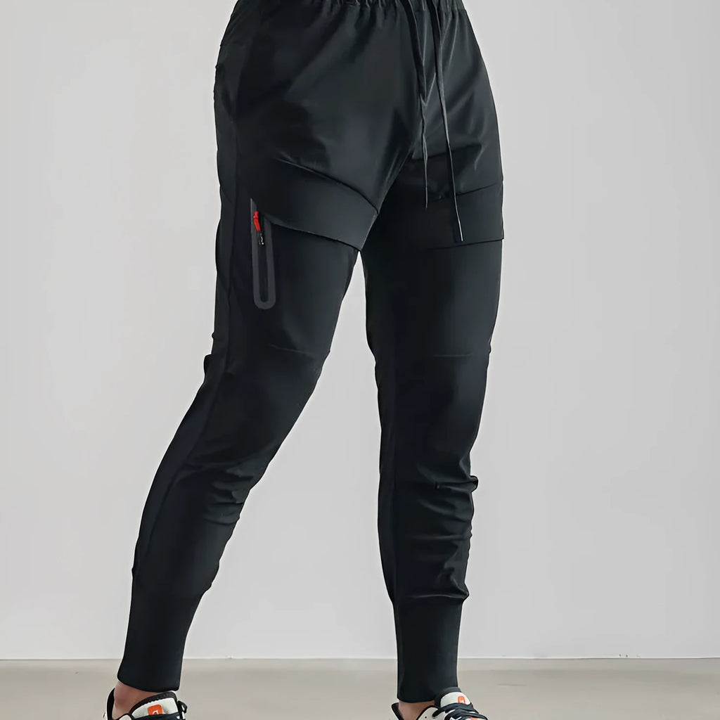Men's solid colour polyester jogger pants in black, mid-waist style, casual sports trousers