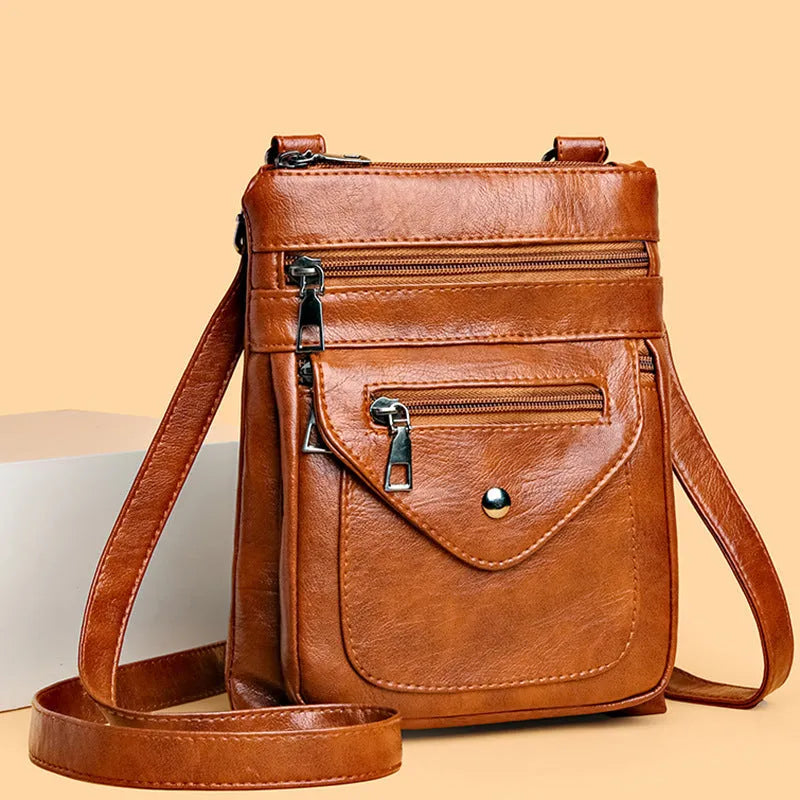 Vertical square crossbody phone shoulder bag in PU with sewing line detail, shown in available colours.