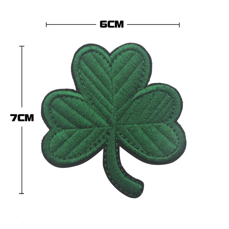 Outdoor embroidered fabric badge with velcro backing showing camouflage design