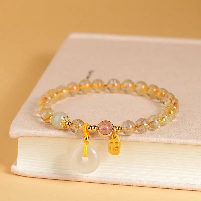 Gold rutilated quartz crystal bracelet with safety buckle and geometric pendant in national style design