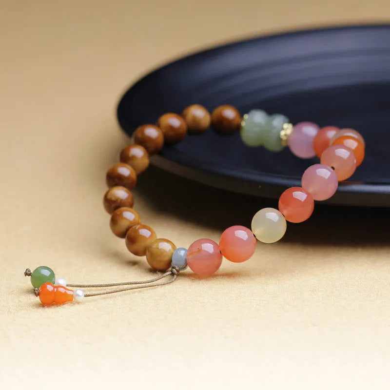 8mm diamond-shaped Hetian jade agate bracelet showing natural persimmon colour patterns