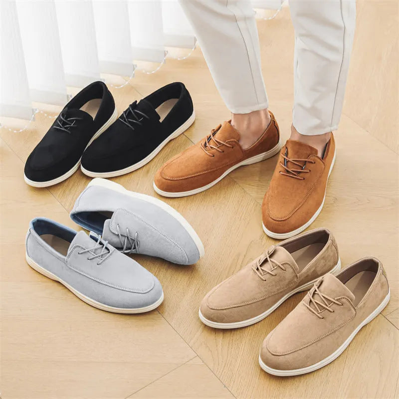 Men's slip-on suede loafers in beige with elastic band and rubber sole, side view