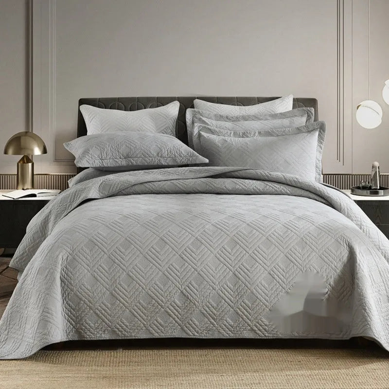 Pure cotton bed cover three-piece set shown in a light colour on a bed, featuring a quilt cover and sheet.