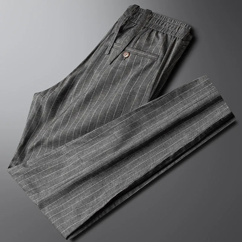 Men's casual linen striped trousers in blue gray, showing elasticated waist and straight leg