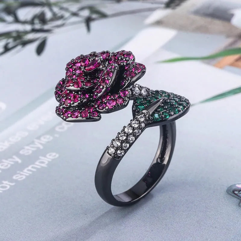 Gold-plated black gold geometric flower ring with simulation red corundum stones