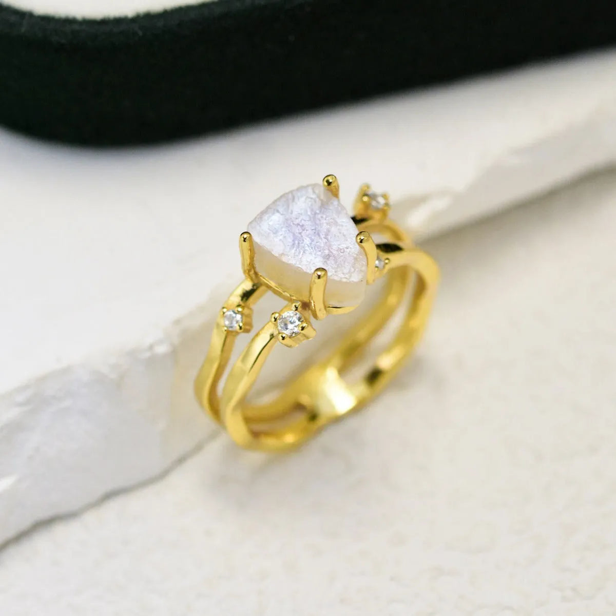 S925 silver irregular triangle moonstone ring in rose gold finish on white background