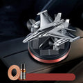 Solar powered rotating fighter jet perfume diffuser in silver with aluminium alloy seat and beech wood wick