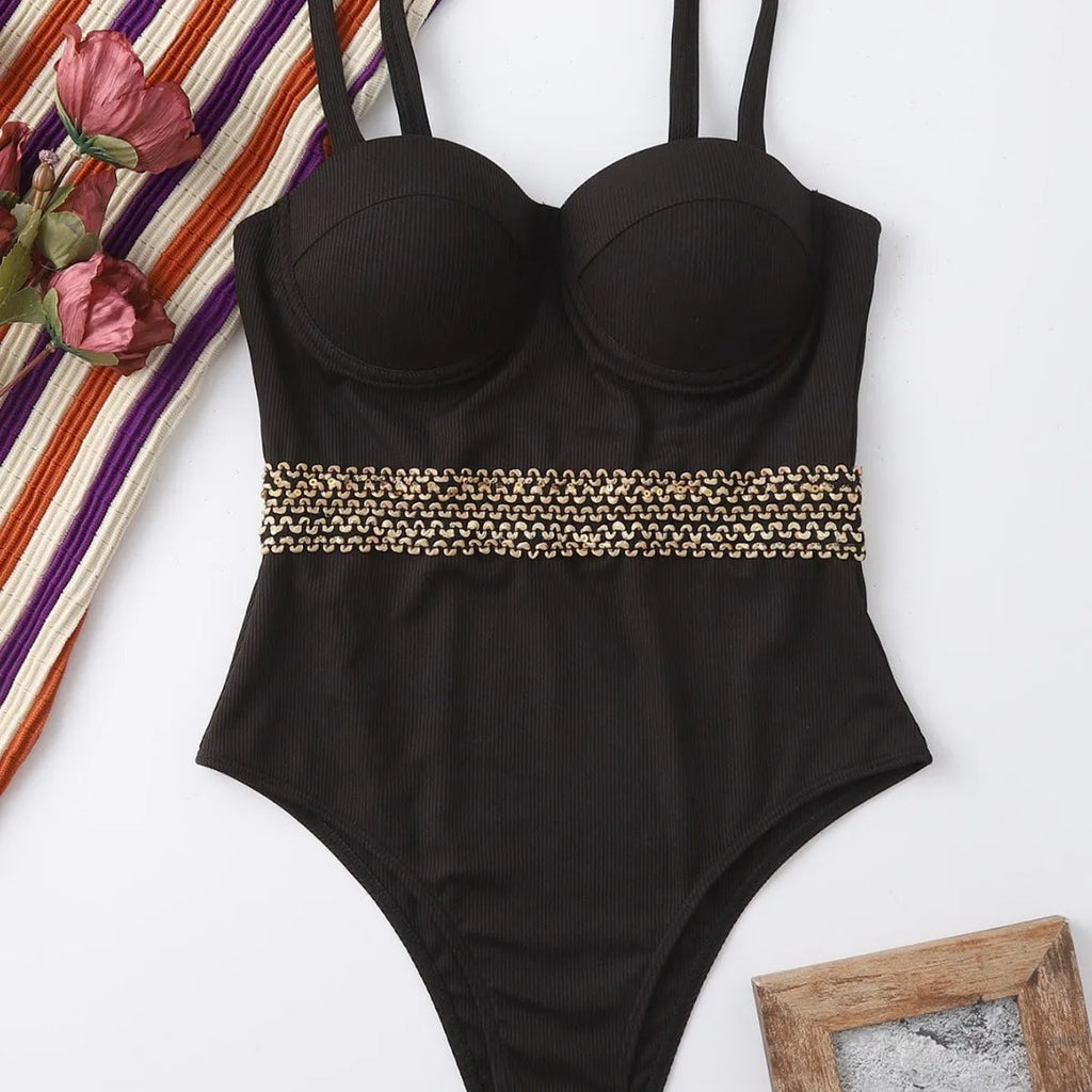 Black one-piece swimsuit for women with adjustable shoulder straps shown on mannequin